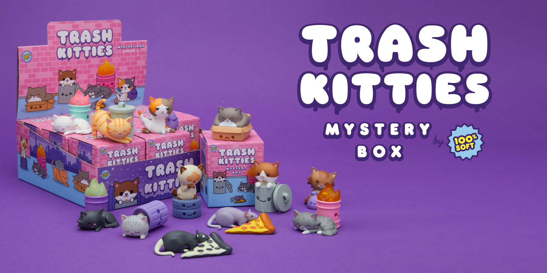 Trash Kitties Mystery Box case with opened figures on and in front of it