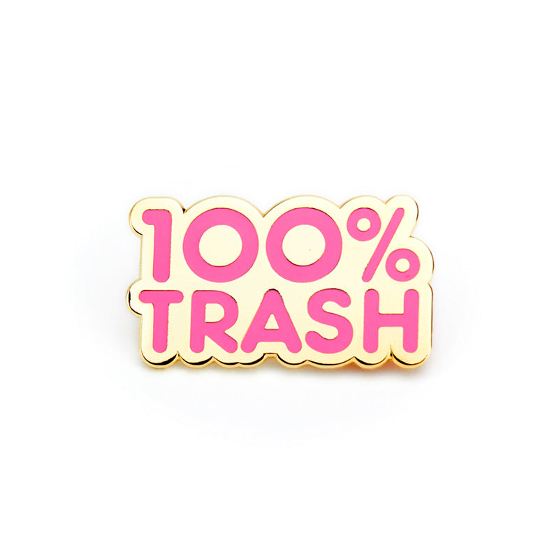 Gold pin with 100% Trash in pink