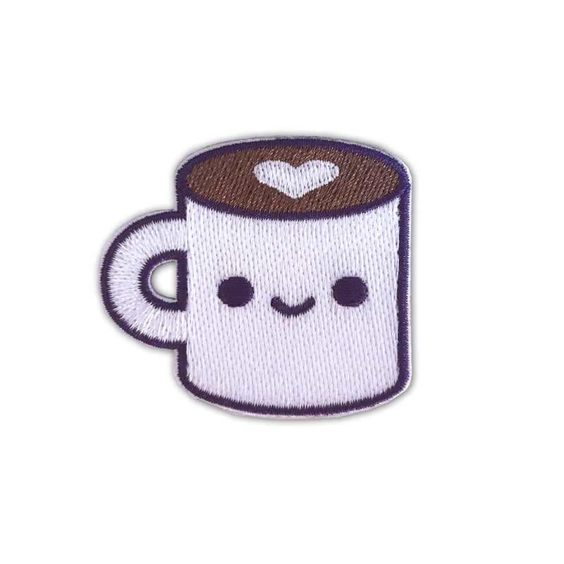 Coffee mug patch with a happy face on the cup and a heart in the coffee. 